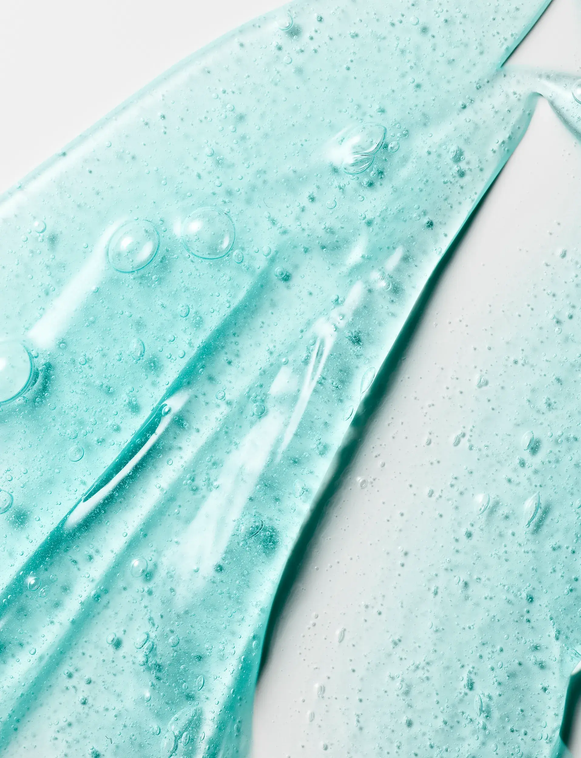 Nioxin Restage Shampoo προϊόν σε δείγμα, διάφανο γαλάζιο με φυσαλίδες